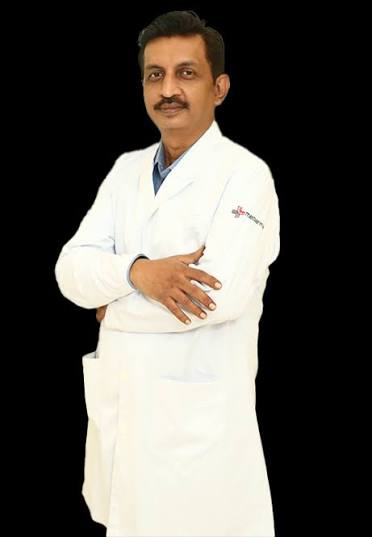 Dr Mukund